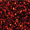 A random illumination pattern. The image shows a random intensity light pattern, or speckle pattern. A similar pattern can be generated by shining a laser through an opaque medium, such as a piece of paper or plastic.