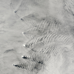 Example of a diffraction pattern. A view from space of the Sandwich Islands, in the Pacific Ocean. One can clearly see the diffraction pattern formed by the waves after these meet the emerging islands.