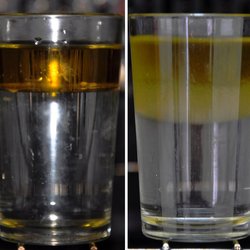 Oil-water Illustration of spin gradient thermometry. At low temperatures, oil and water do not mix and form clearly separated phases with a tiny interface (left). At higher temperatures, the interface region is considerably larger, allowing one to deduce the temperature of the fluids (right).